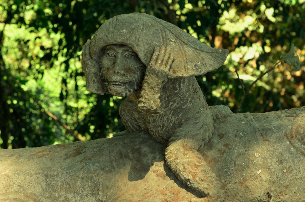 Monkey statue with leaf in Ubud Monkey Forest