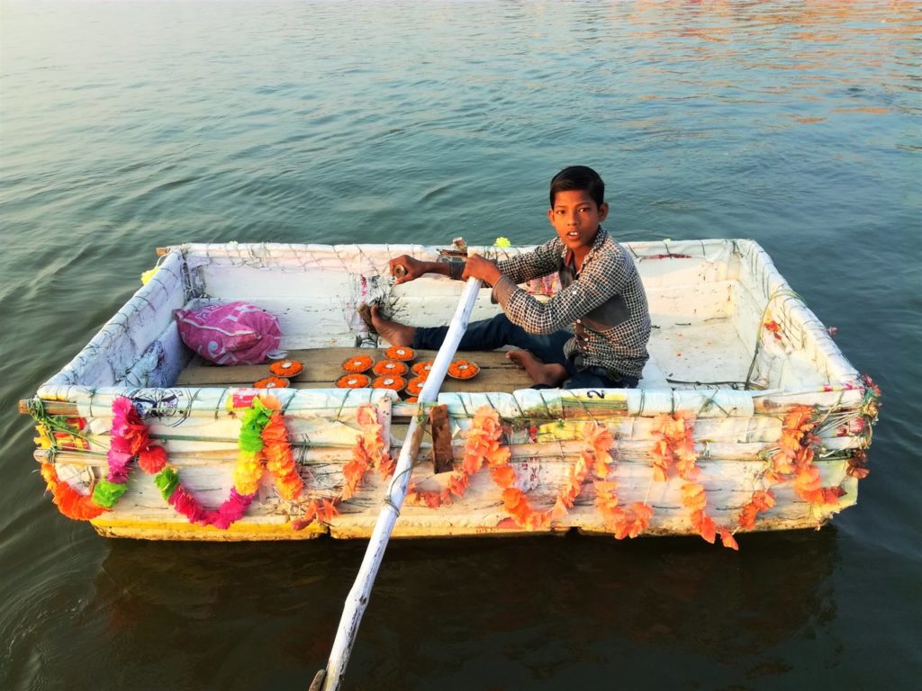 Selling lamps on the Ganges